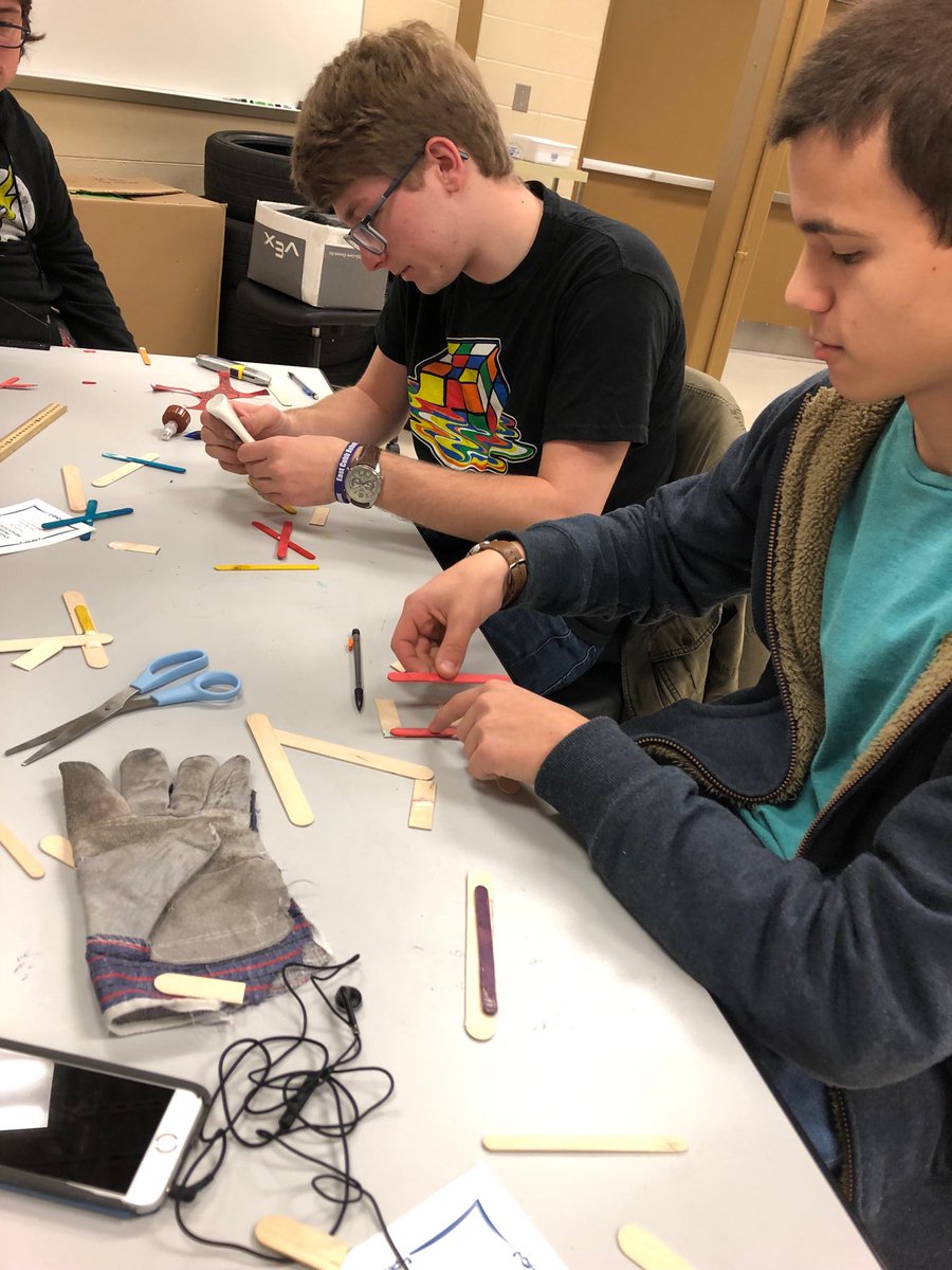JeffreyPaulMill's tweet photo. The sophomore engineering students are building popsicle stick bridges in a competition against each other. The highest ratio of weight held versus weight of bridge wins. https://t.co/3OO4nYpeyl