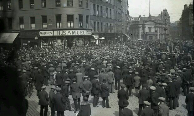 The British General Strike begins, 4 May 1926. Pictured - strikers in Dundee.