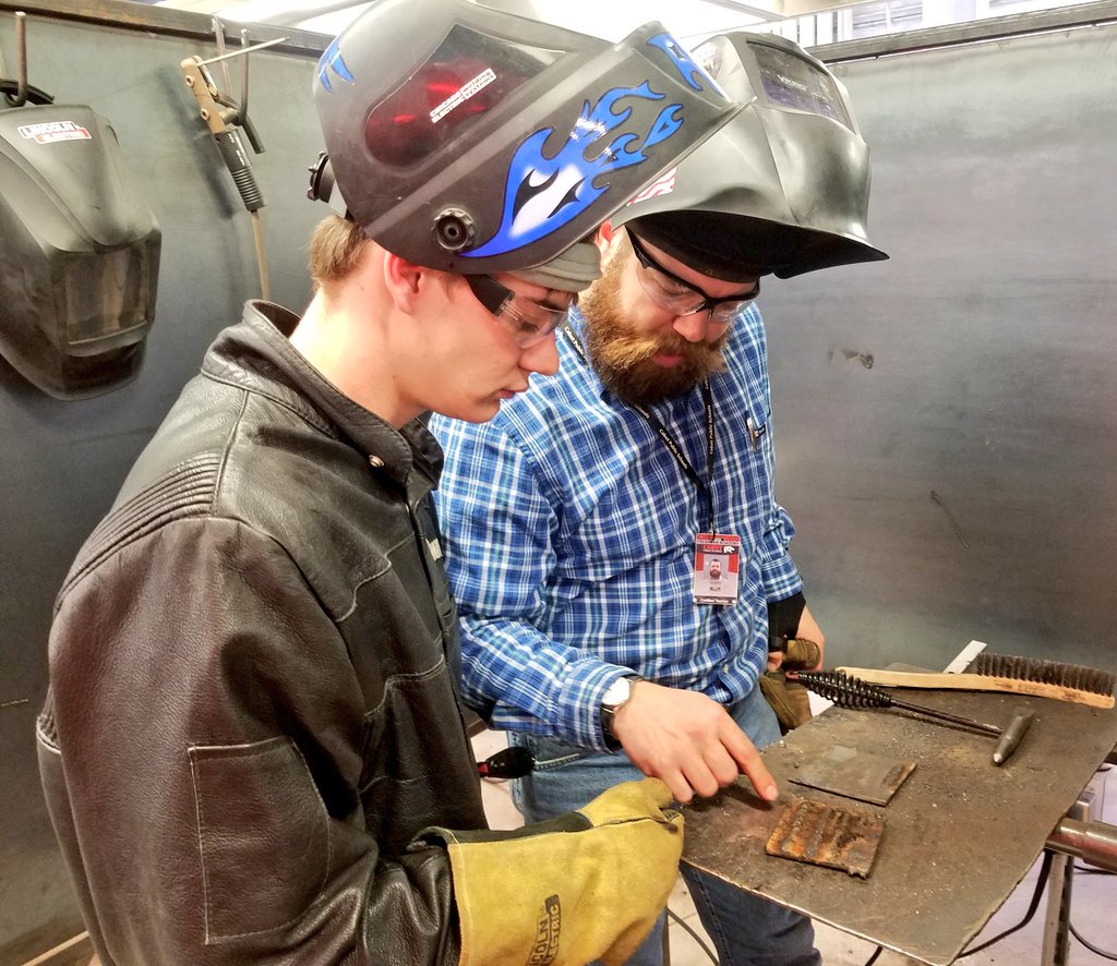 CabotHigh's tweet photo. The Ag Metal Shop is a hub of activity as students practice their  welding and receive feedback from their instructor. @CHScareertech @CabotFFA @DrTCabot #bestofchs #jobready @mikeroweworks https://t.co/zAADnfL5W4