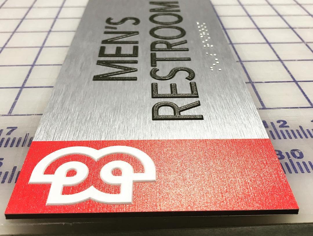 DCS_US's tweet photo. We are always fond of signs where every element is UV printed. The group at #KCCustomSigns used their #DCS equipment to not only print the compliant #Braille elements, but also the red border and #TEXTUR3D white logo. Nice work guys – keep it up! https://t.co/2O5VhWNrw4