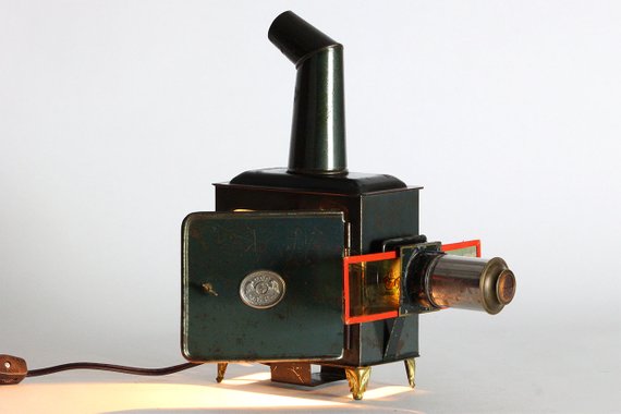 RetroPickers's tweet image. Antique 1908 Standard Ernst Plank Toy Magic Lantern Table Lamp w/ Color Slides &amp;amp; Original box – etsy.me/2XqUOrZ