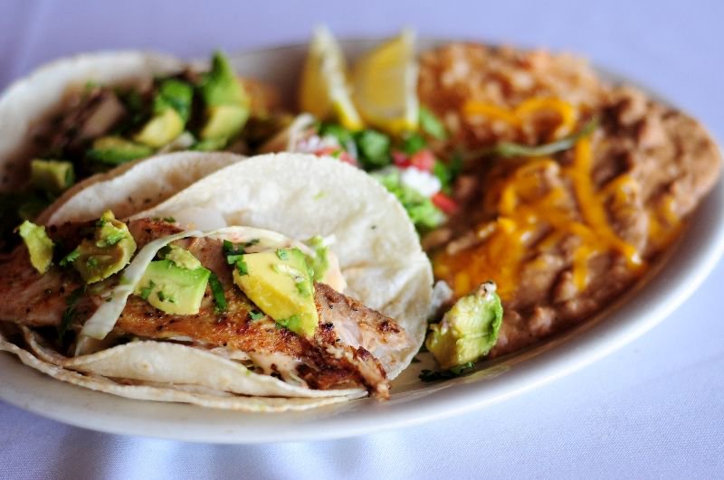Dreaming of warmer days and Summer fare? Our Fish Tacos are grilled to perfection!