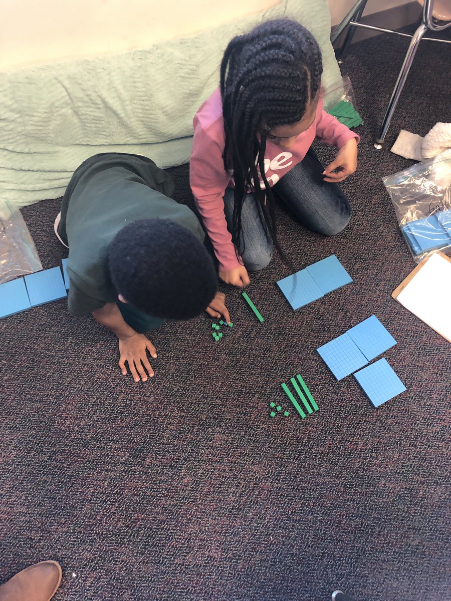 ClassensClass's tweet image. Using our place value blocks to solve three-digit addition problems. These kids are doing an amazing job collaborating this week! #teamwork #WeAreBrierCreek