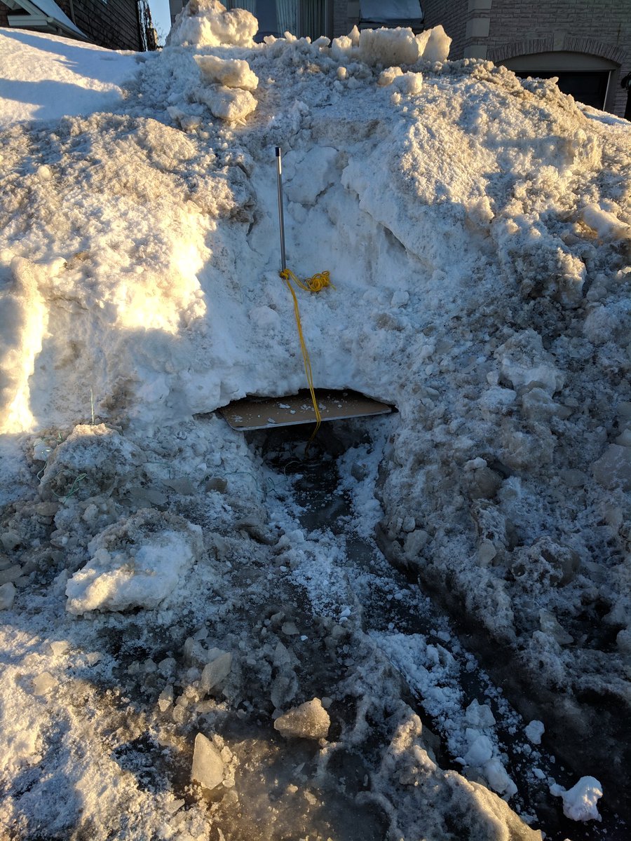 NaveenEipe's tweet photo. Thanks @ottawacity for excavating the drain from under the snowbank on our #floodedstreet
Now a #yellowrope, #metalpole and #TempRoof should keep it from getting covered up again! #MacGyver
#WindStorm
@BlacksWeather @CBCOttawa https://t.co/3BvgA7mezs