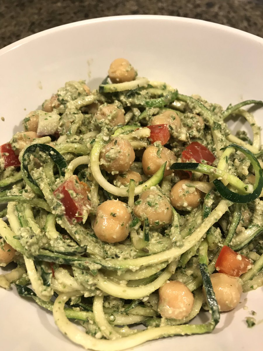 Zucchini Noodles, arugula pesto, red reppers, red onions and chickpeas. I love eating raw vegan 