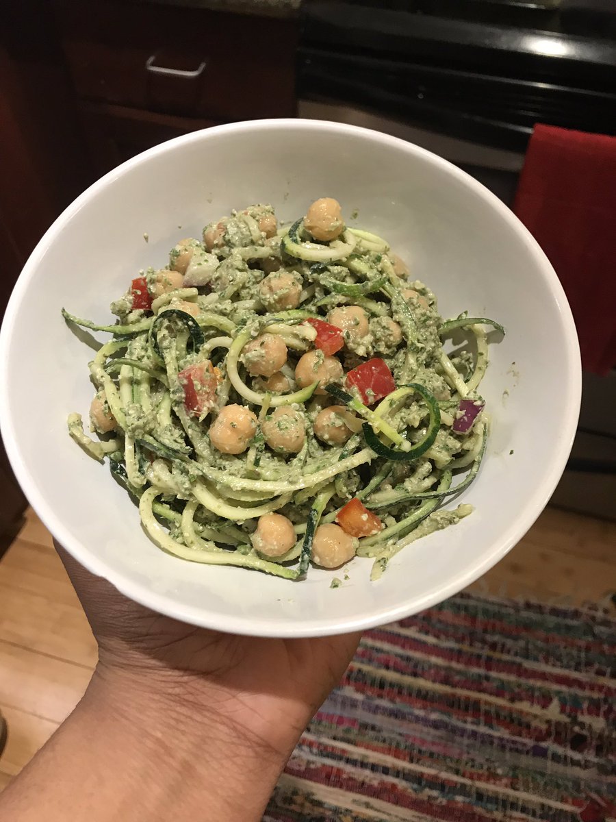 Zucchini Noodles, arugula pesto, red reppers, red onions and chickpeas. I love eating raw vegan 