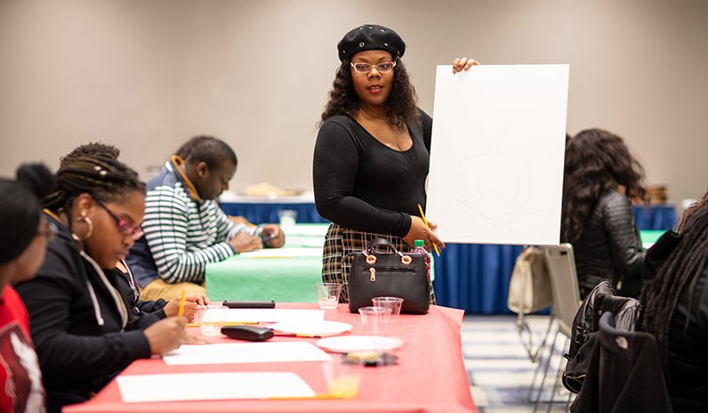 MillikinU's tweet photo. Alyssa Farmer is an artist on a mission. She hopes to one day run her own art studio in Chicago and have an opportunity to do what she recently did on Feb. 15 – teach painting classes and workshops. https://t.co/1L4FPJv777 https://t.co/LQ4Tw8SUT4
