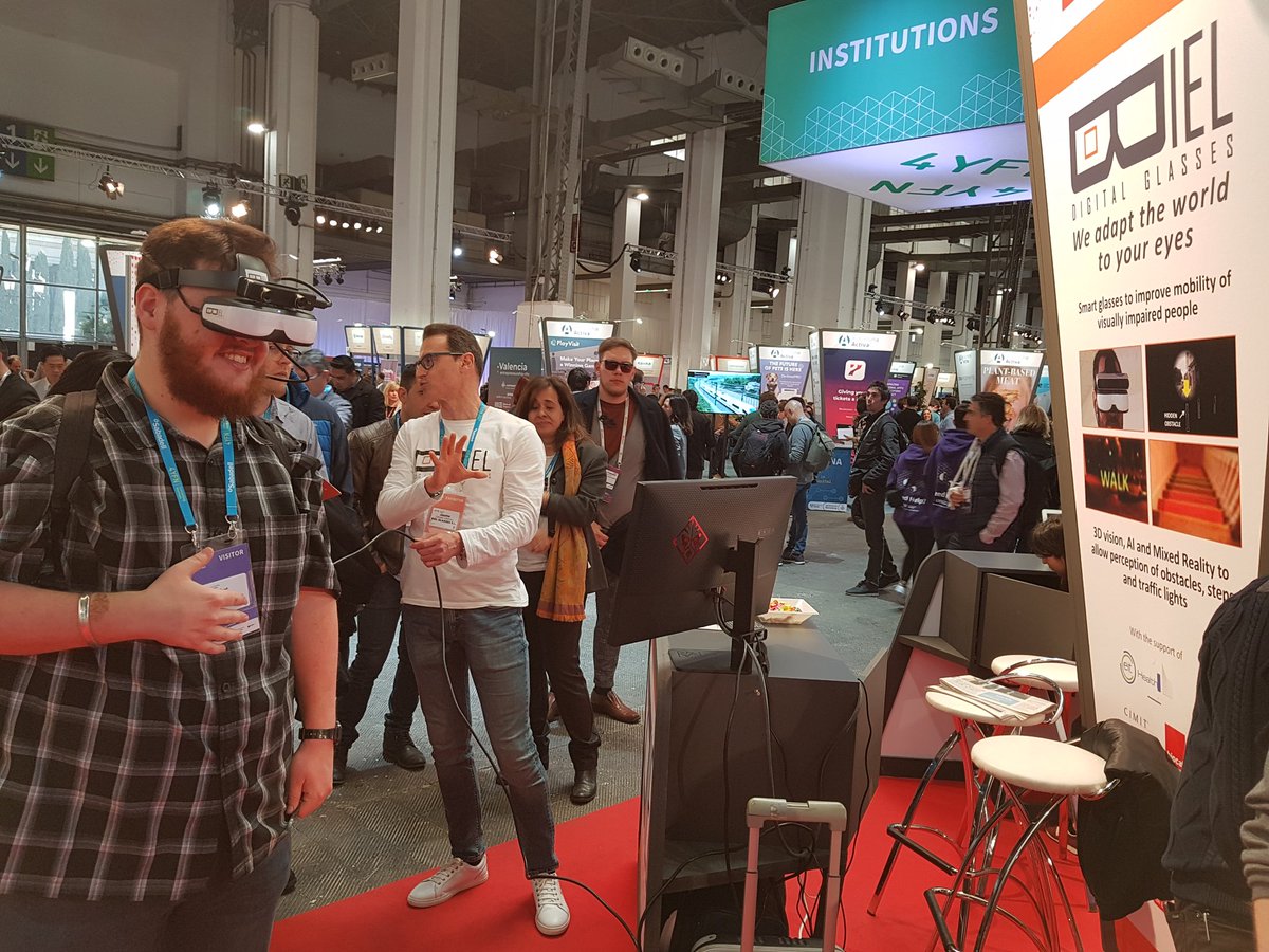 BielGlasses's tweet photo. Come and test our prototype of smart glasses for people who have low vision at our booth at #4YFN19 ! Today is the last day!!! Thank you @aurafundacio for testing! 

With the support of @EIT_Health_es ,@biocat_en, @accio_cat, @m4_social @EU_EASME https://t.co/JTXxrCQoCO