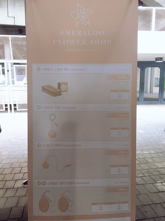 He opens up his shop, coincidentally, on the first day of the Love Yourself World Tour.But, there are no coincidences.At the concert venue, a sudden booth called Smeraldo Flower Shop sold cute merch decorated with the Smeraldo logo! BH did it all for us cr:  @cafe_army