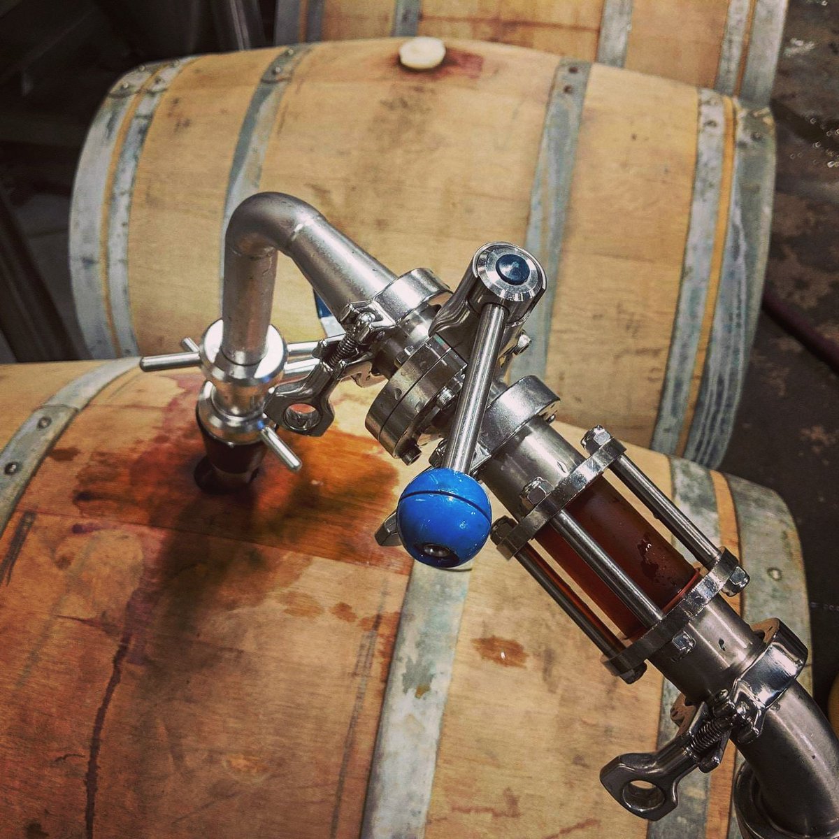 Sensory overload here while we deposit barren wood into port barrels that then held bourbon. 👃😍