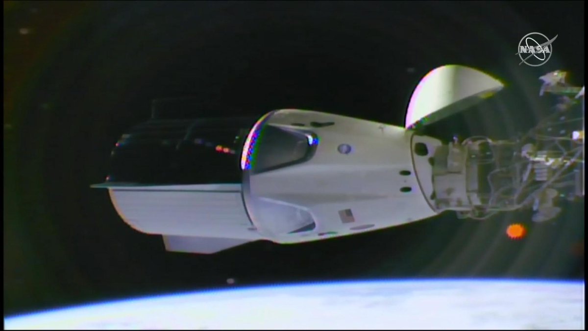 ken_kremer's tweet photo. "SpaceX Crew Dragon Successfully Docks at International Space Station" - #SpaceX #CrewDragon #Falcon9 #NASA International @Space_Station #ISS #Demo1 #Exp58 . Read my story: @ken_kremer https://t.co/RFEPB7Z1OQ
