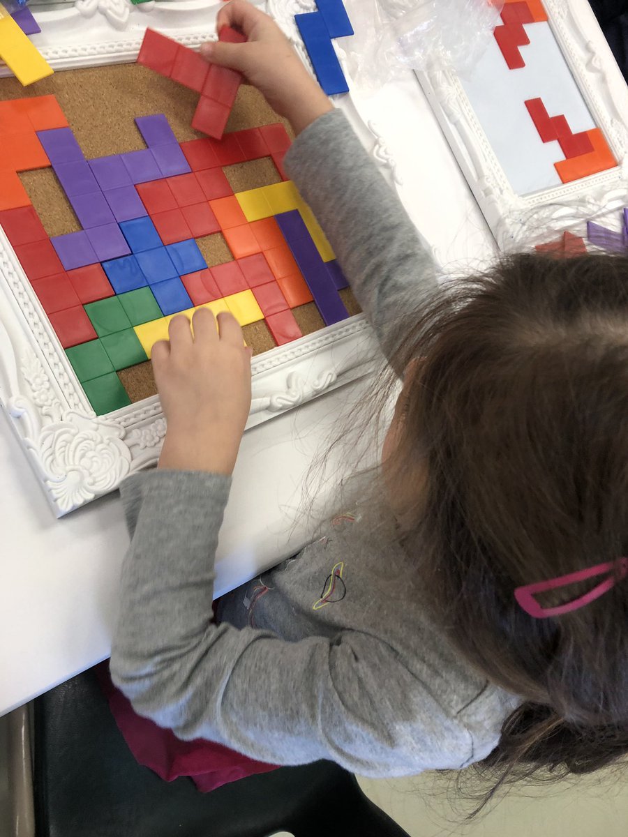 SLRMRSSB's tweet photo. How can you fill in the space with pentominoes? Do you see a picture in the shapes? “I made a house and the sky!” #mathfdk #spatialawarenessfdk #shapes #geometryfdk https://t.co/YDYxqNLOAN