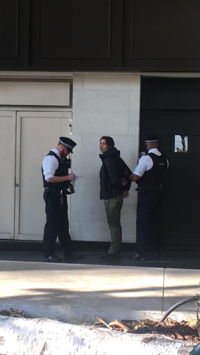 ExtinctionR's tweet photo. BREAKING: @JackHarries, 25, filmmaker, has been arrested for nonviolent protest at Int Petroleum Week, where oil &amp; gas industry leaders plan to extract more fossil fuels contributing to mass genocide. Whose acts are more criminal? #extinctionrebellion #IPWeek https://t.co/JDBgPH22PQ