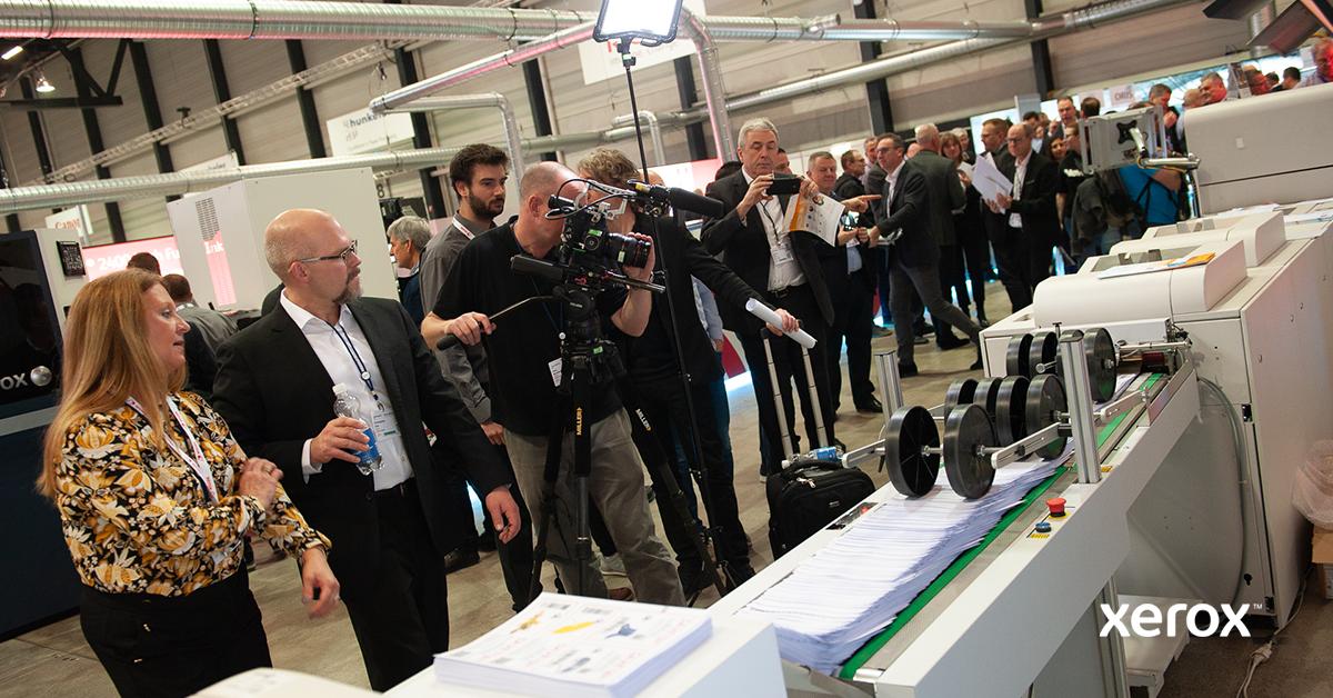 Xerox's tweet photo. Lights. Camera. Action.🎬
Making its debut at #HID19 is the new Xerox Rialto 900 MP #Inkjet Press, stop by and take a look. https://t.co/3WRCTI2Ay0 https://t.co/tkaymCuHBb