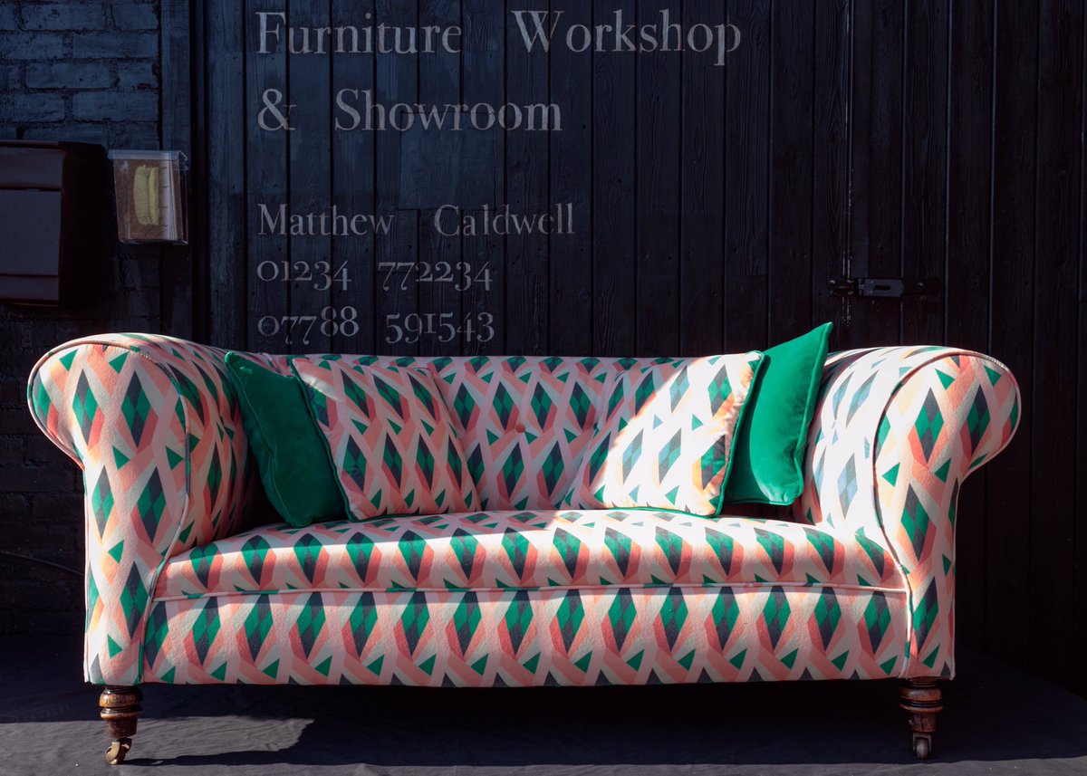 Edwardian Chesterfield on turned supports with brass casters. Traditionally reupholstered in <a href="/linwood_fabric/">Linwood Fabrics & Wallpapers</a>