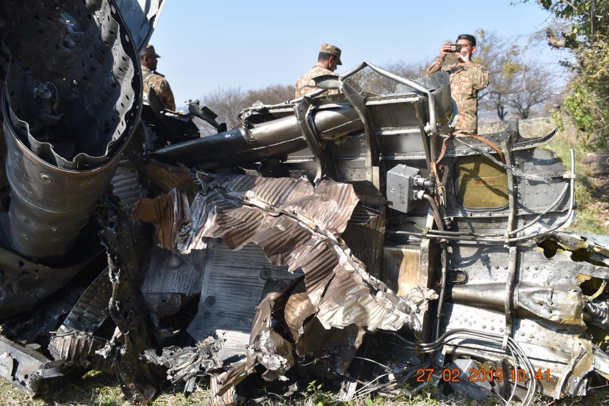 Anaslqbal's tweet photo. Photo 1 : Destroyed Indian MiG at Pakistan side.
Photo 2 : Destroyed Indian MiG at Indian side.

Why Indian media isn't showing and informing it's nation about aircraft destroyed at their side?

#SayNoToWar https://t.co/MRiBKlsRld