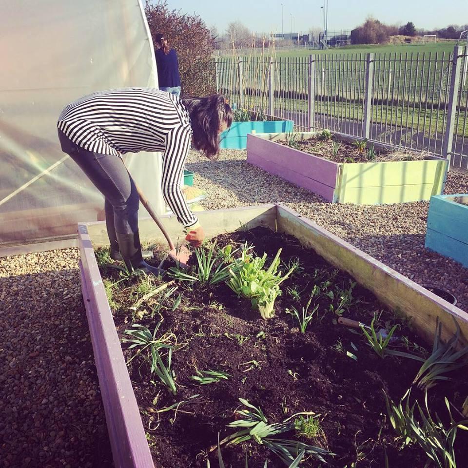 This is one of our local volunteers. She is an amazing person. She bakes the bread and makes magic soups for our community meals. Today she started work on the raised bed we have donated to her family. Here she will grow many herbs for more amazing recipes and to feed the family