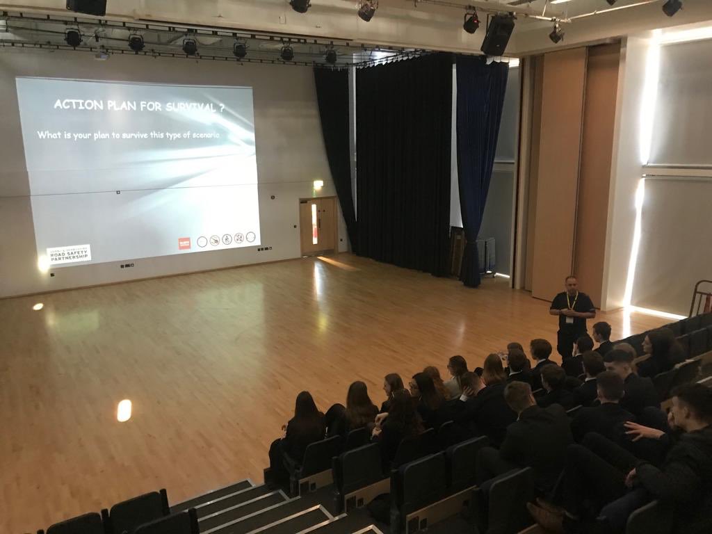 DerbyshireRPU's tweet photo. Craig and Alex have been to Ecclesbourne School in Duffield today. Together with @DerbyshireFRS and @Derbyshirecc delivering the Young Driver Education Programme to 125 teens just about to start driving. And in typical traffic cop style bagged a school dinner. #RoadSafety #YDEP https://t.co/SZ6bU1zocp