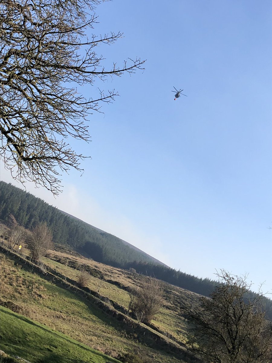 EoghanCon11's tweet photo. As I cycled to #Killakee viewing point an @IrishAirCorps #AW139 from @OC3OPS flew overhead for #Wicklow to help @FireWicklow 
Great resource the heli with the #BambiBucket 
So versatile, from #Aircorps112 to fire fighting to transport https://t.co/87XGMmSTMh