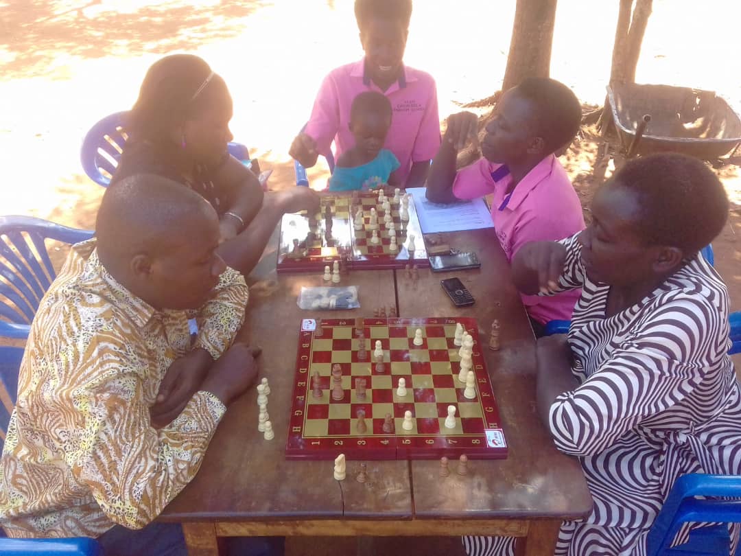 TusomeAfrica's tweet photo. Today we are learning with teachers at Canon Ibula Primary School, Iganga how to play board games. The hunt for the #GemsofIganga is on. #chess #scrabble #abstractThinkers
@Airtel_Ug https://t.co/vwf0ZigFqk