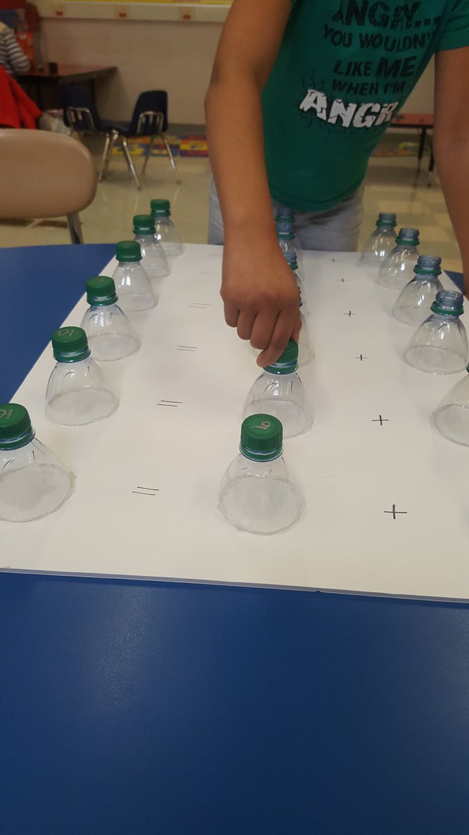 vcann_OT's tweet photo. Bottle cap math #learningwithOT #schoolOTrocks https://t.co/DtW3EXqZ9J