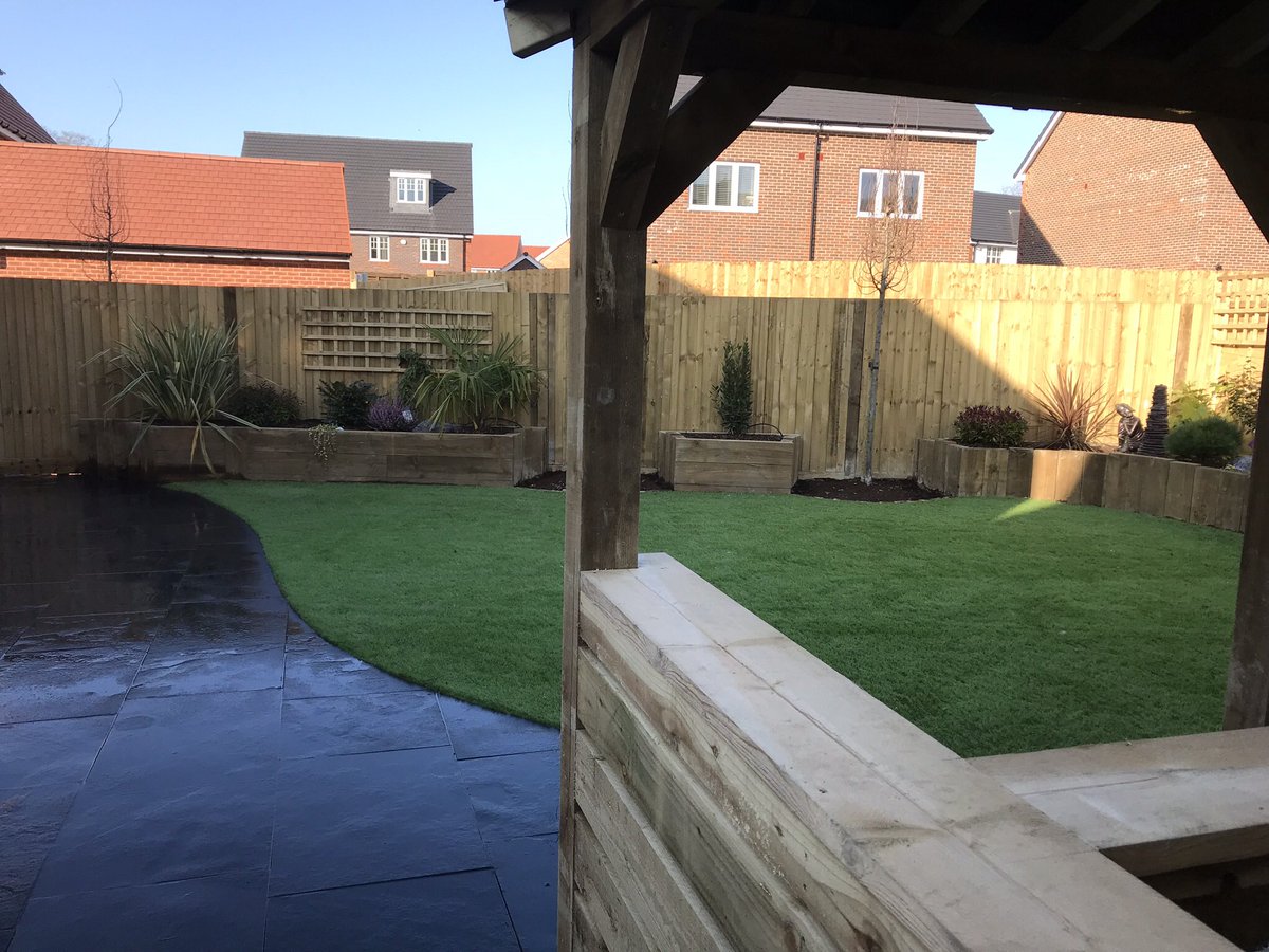 BuckinghamsLand's tweet image. From a mud patch to this beautiful garden. Limestone paving, artificial turf, raised sleeper beds and a bar area ready for any summer party. A full garden makeover with just the lighting and hot tub to finish off #hardlandscaping #patios #paving