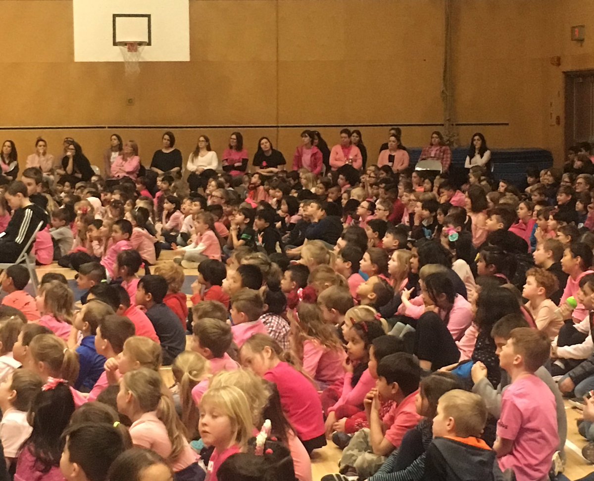 RoadLatimer's tweet photo. @RoadLatimer is sharing their ideas and presentations on kindness at our school wide assembly #BeKind #PinkShirtDay2019 #sd36learn @Surrey_Schools https://t.co/C5Qv7vbSdR
