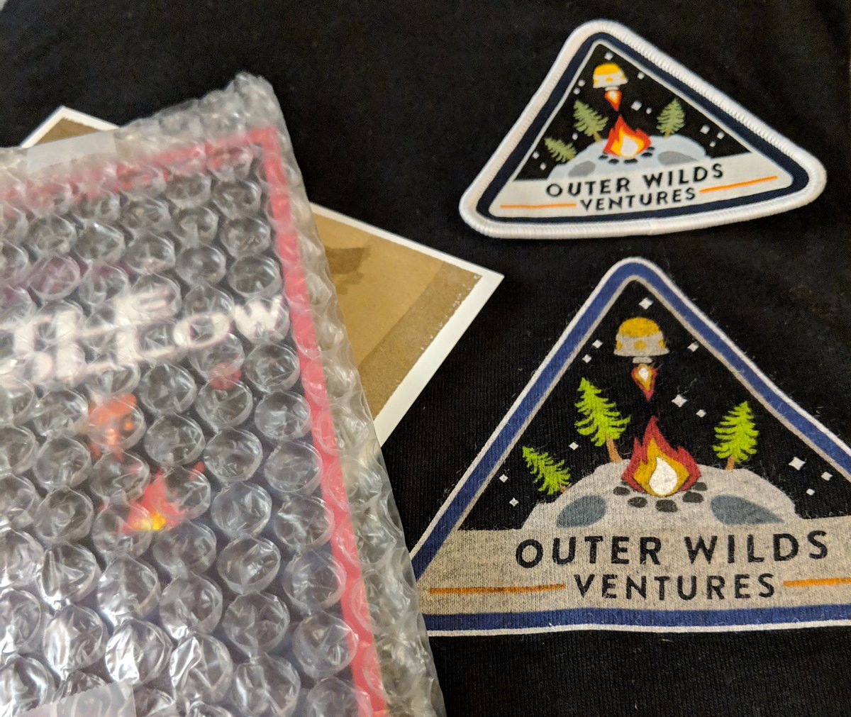 dpittman42's tweet photo. @PlayFig @A_i Got a surprise package of Outer Wilds backer stuff today! 😁 #OuterWildsVentures https://t.co/uBcKPynef4
