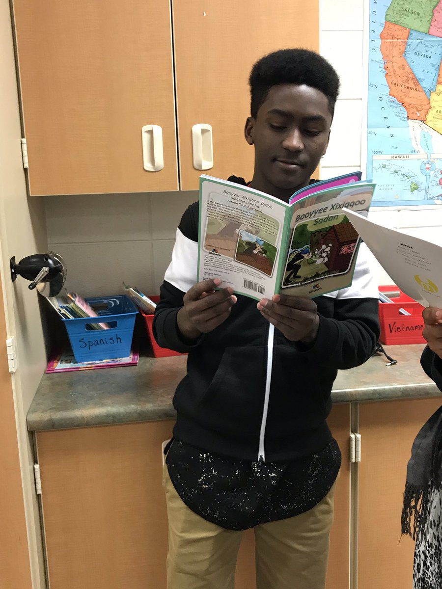 MsSchealler's tweet photo. We are SO EXCITED to incorporate more dual language and high interest books into our classroom library. Can you speak two languages? Can you read a book in two languages? These students can! 🤓 #additivebilingualism #ESL https://t.co/IbrAKIc2DM