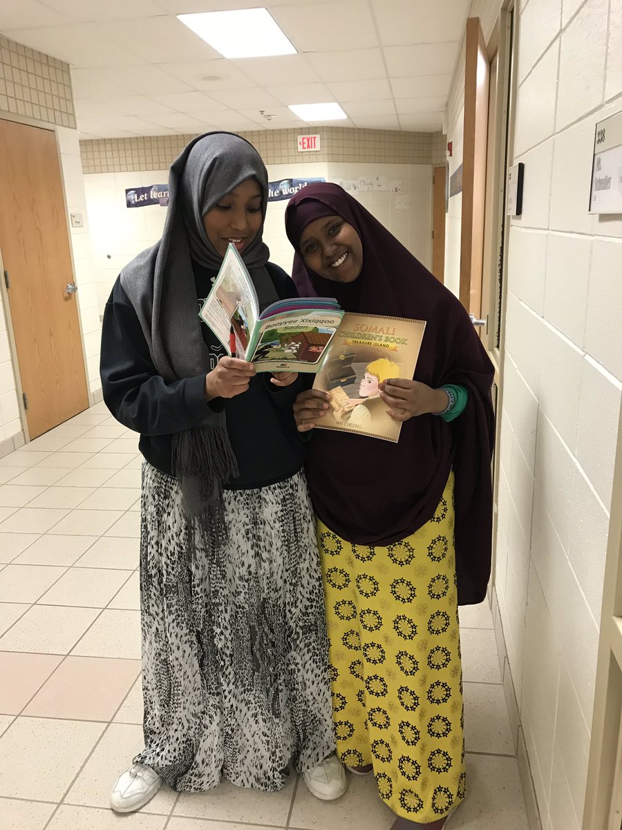 MsSchealler's tweet photo. We are SO EXCITED to incorporate more dual language and high interest books into our classroom library. Can you speak two languages? Can you read a book in two languages? These students can! 🤓 #additivebilingualism #ESL https://t.co/IbrAKIc2DM