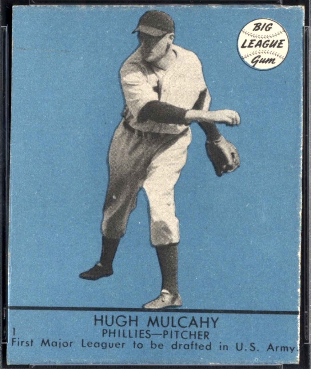 Number5TypeCard's tweet photo. Cards To See Before You Die: 

1941 Goudey Big League Gum, #1 Hugh Mulcahy

Despite his card's blank back, Goudey found way to recognize Hugh as 1st MLBer drafted for WWII, March 1941, nine months before Pearl Harbor. He served until Aug 1945.

#BucketCards https://t.co/f1HqWb1YGn