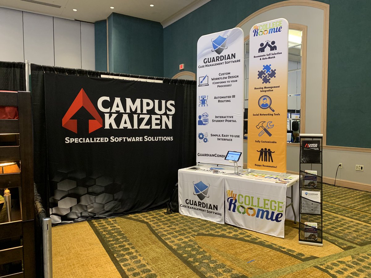 CampusKaizen's tweet photo. We may be in the back of the exhibit hall, but our banners are flying high at @SEAHOconnect! Excited to be showcasing both @MyCollegeRoomi &amp; @GuardianConduct! #seaho2019 #seaho19 https://t.co/DOS8HUPbgg