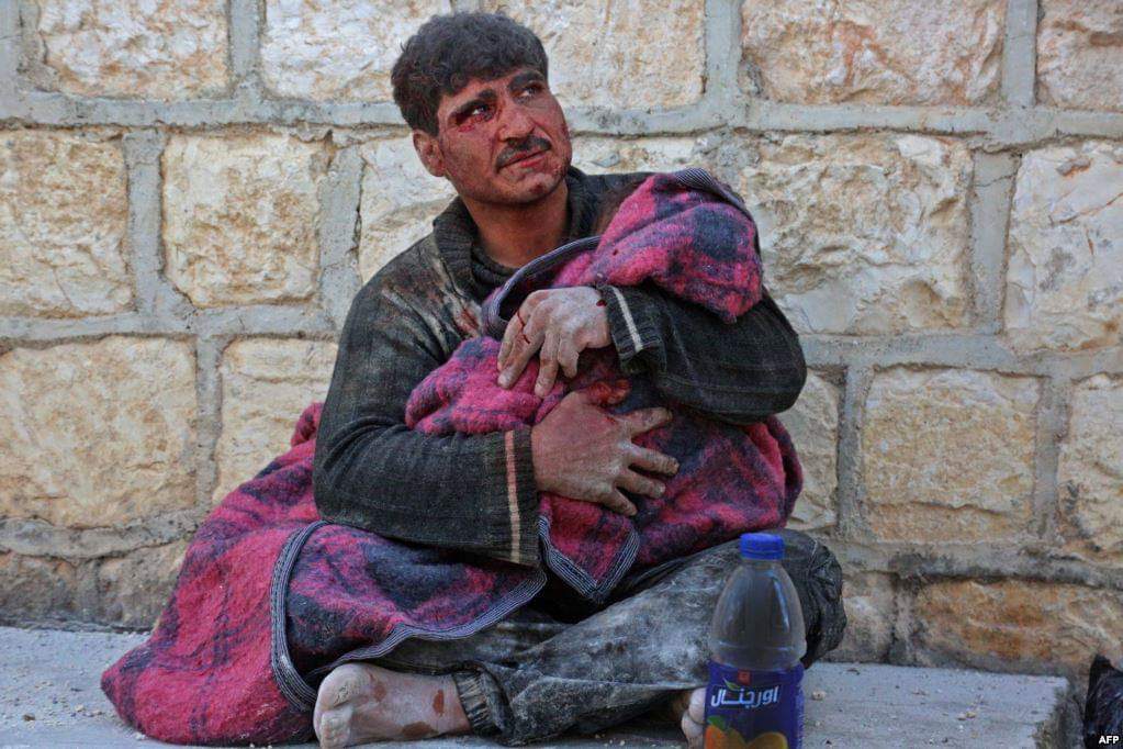 A Syrian man weeps as he cradles the body of his daughter who was killed following reported shelling in the town of Khan Shikhon in the southern countryside of the rebel-held Idlib province
(Photo credit should read ANAS AL-DYAB/AFP/Getty Images)
#Idlib 
#EyesOnIdlib