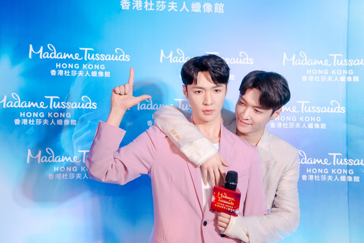 TussaudsHK's tweet photo. Lay @layzhang unveiled his 3rd figure at Madame Tussauds Hong Kong today, becoming the first 90s artist who has three wax figures! He took many cool pictures with his twin brother and created a nickname for him too! Guess what is it? Come and visit him at @TussaudsHK now! https://t.co/vvF2zZp5mm
