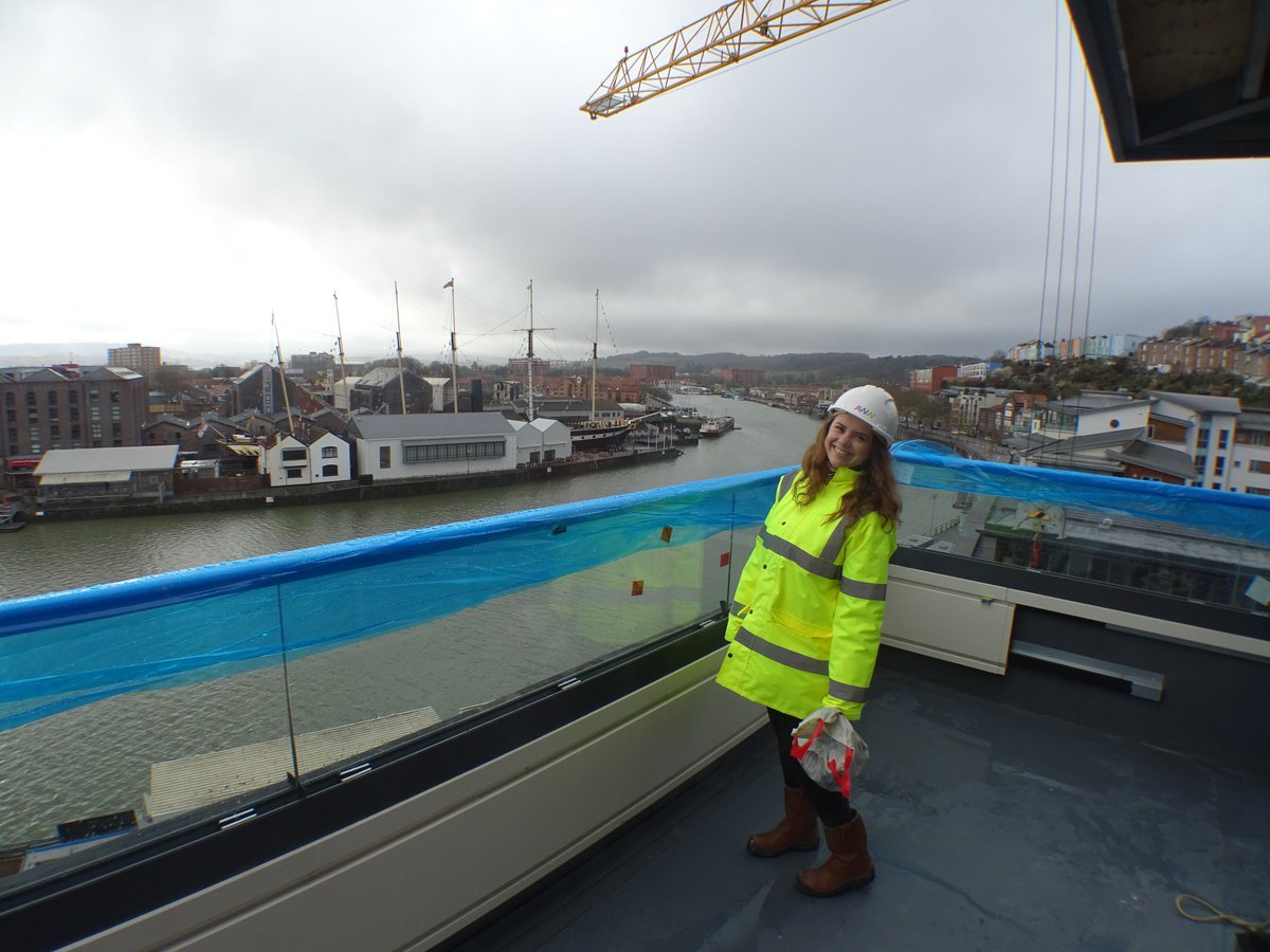 AWWinspired's tweet photo. Roberta standing on one the duplex terraces situated the fifth floor of the nearly completed Retort House at Brandon Yard. Just imagine the views over #Bristol #harbour when it's a clear day ☀️ #AWWtransformation https://t.co/IOnyvU2QyR