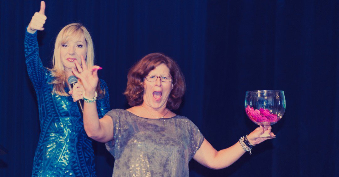 OvarianCanada's tweet photo. #TBT: In 2017 Jessica Holmes brought the house down with her comedic genius and impressive wig collection at THE LADY BALL #Calgary. @happyfeetholmes is back this year and you don't want to miss it. 
Buy tickets online for THE LADY BALL Calgary 2019:
https://t.co/0SAggh6wb0 https://t.co/eaEjHc0z1m