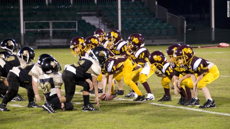 CNN's tweet photo. In a first for any national football organization, the Pop Warner youth league announced that it will ban the traditional three-point stance https://t.co/4Hpia788ew https://t.co/yZR103FTRb