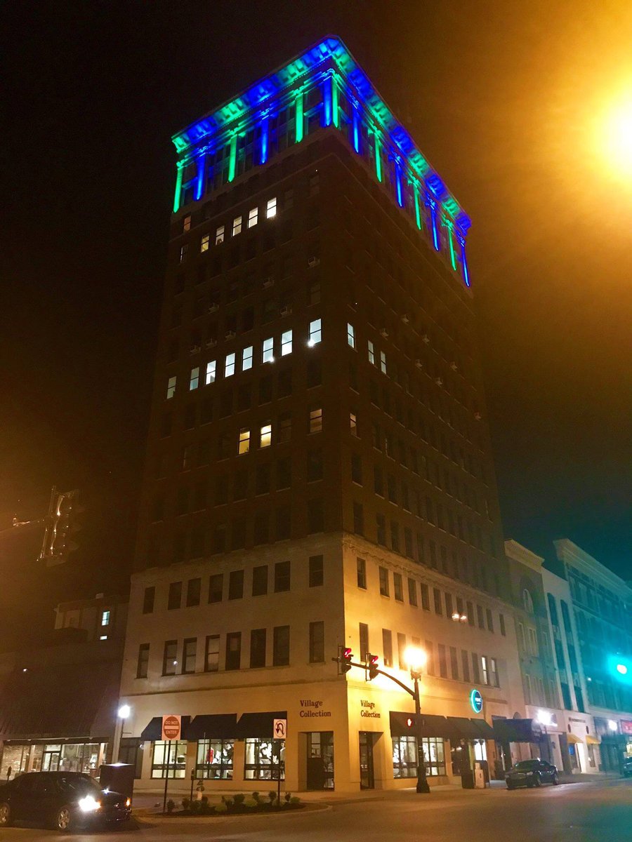 MUWG_Center's tweet photo. We appreciate The West Virginia Building partnering with us to promote #NEDAwareness this week as WV’s first #LandmarkLighting! 💚💙💚 https://t.co/kHwn8yMNPN