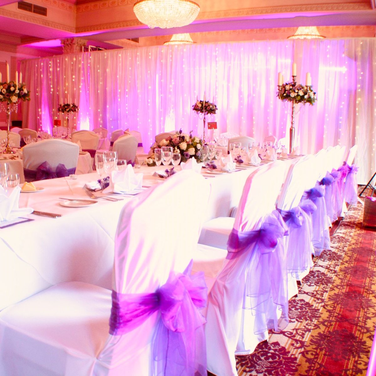 Fairy lights &amp; coloured lighting - an ideal way to compliment our wall drapes.
#weddingdecor
#venuetransformation
@downhall01
