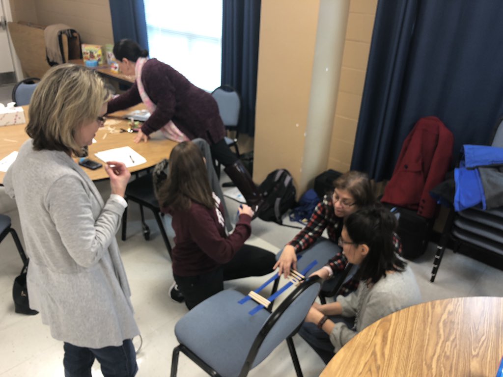 sher_miles's tweet photo. @LJJacksonECC teachers building a 12”x12” “bridge” using 60 craft sticks, 10 rubber bands and a strip of tape. #stemplanning #thinkdeeply #lisdpk @LisdLearns @LISDScience https://t.co/dnc4THds7N