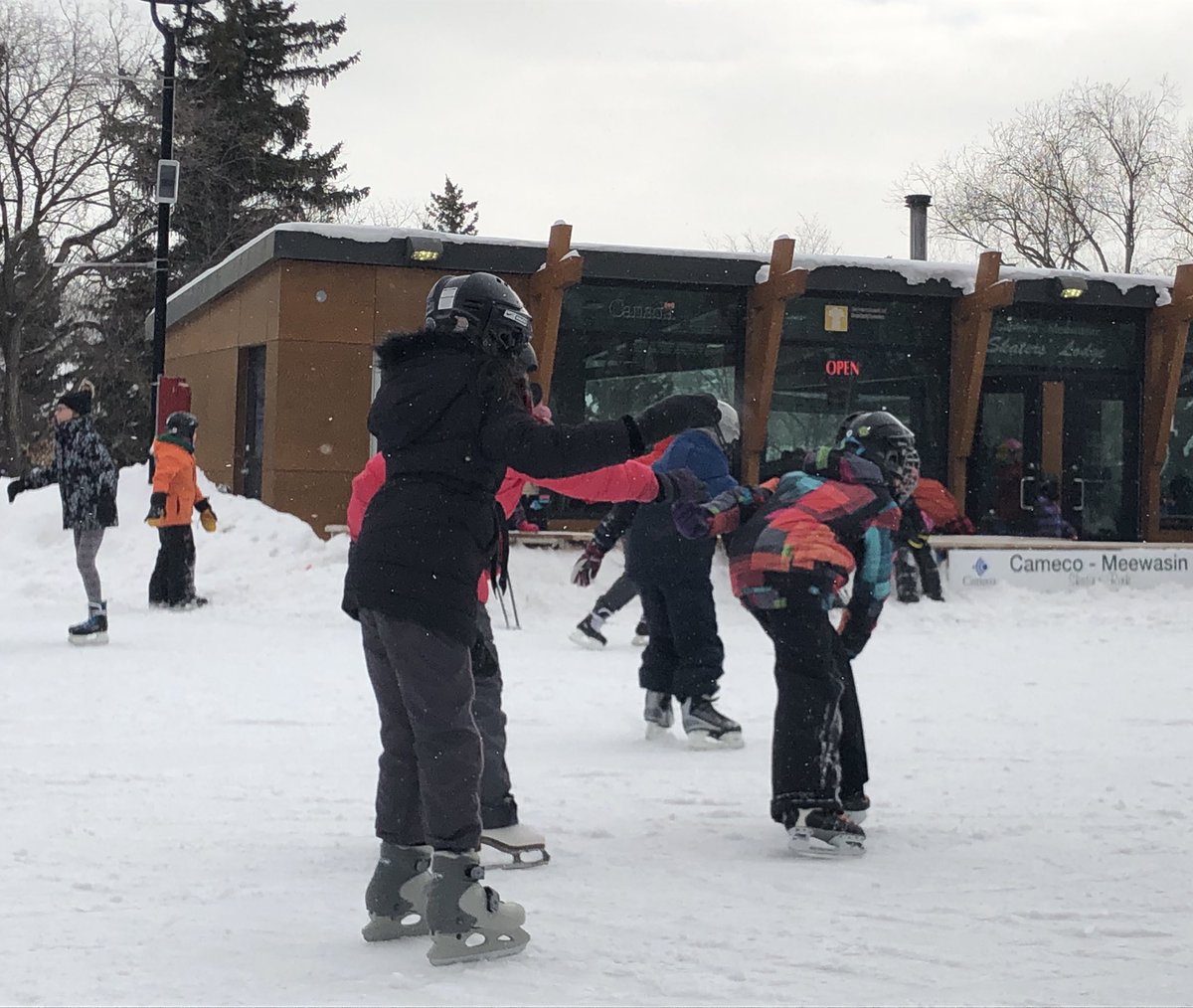 StoonPubSchools's tweet photo. These @BrevoortPark students are happy that the cold snap is finally over! Students hopped on a @stoontransit bus for a morning of learning downtown and then had lunch and skated at @Meewasin rink. #spslearn #move2grow https://t.co/88LRwQy9QL
