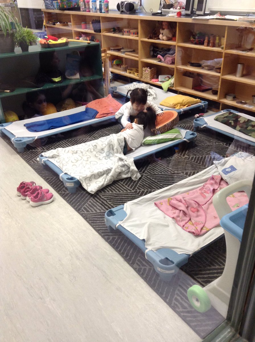 BHbeginnings's tweet photo. A little help getting tucked into bed by a good friend (notice the shoes!) @balmoralhall #friendship #naptime #3yearold #empathy #bhbold https://t.co/mKLDRHs9uI
