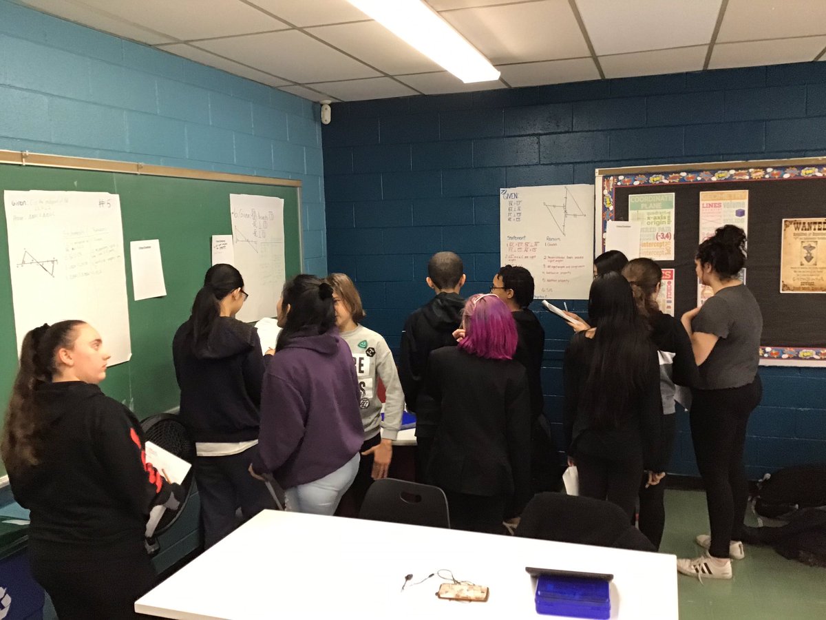 The students enjoyed critiquing and complimenting their peers during their gallery walk today. <a href="/mineolahs/">Mineola High School</a> #MineolaPROUD  #GeometricProofs #SelfAssessment
