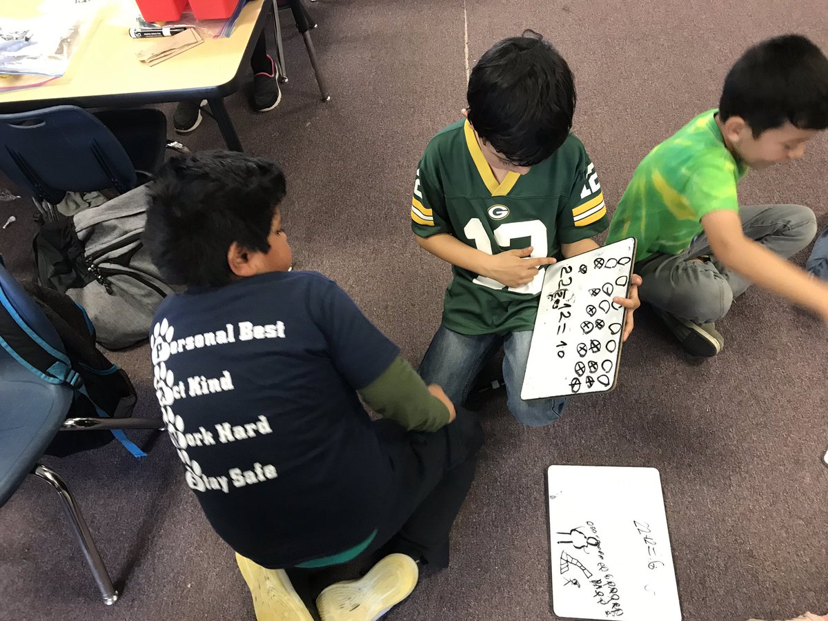 MissMendoza's tweet photo. Students sharing their strategies with each other for today’s math story problem. I love how invested they are into each other’s thinking. #olivepride #LetStudentsTeach https://t.co/wenb13QKLj