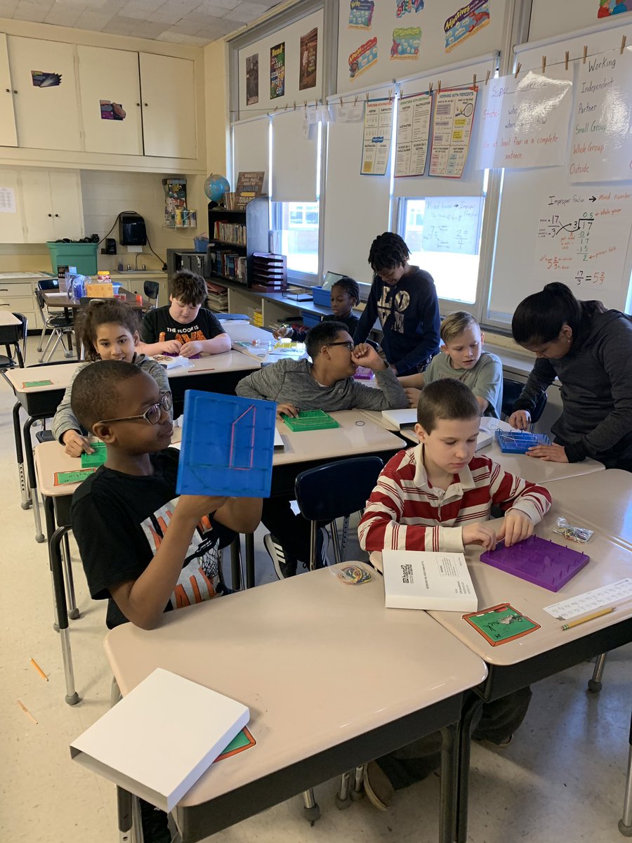 Lisa88Bailey's tweet photo. Mr. Hurlock’s class learning about area and perimeter using geo boards. We had a blast. #BetheOne #FREDstrong https://t.co/OV89O4ZOo8