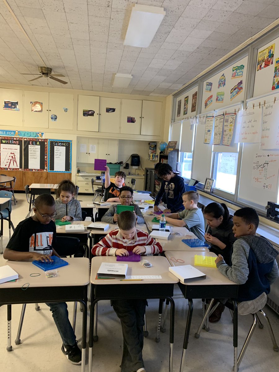 Lisa88Bailey's tweet photo. Mr. Hurlock’s class learning about area and perimeter using geo boards. We had a blast. #BetheOne #FREDstrong https://t.co/OV89O4ZOo8