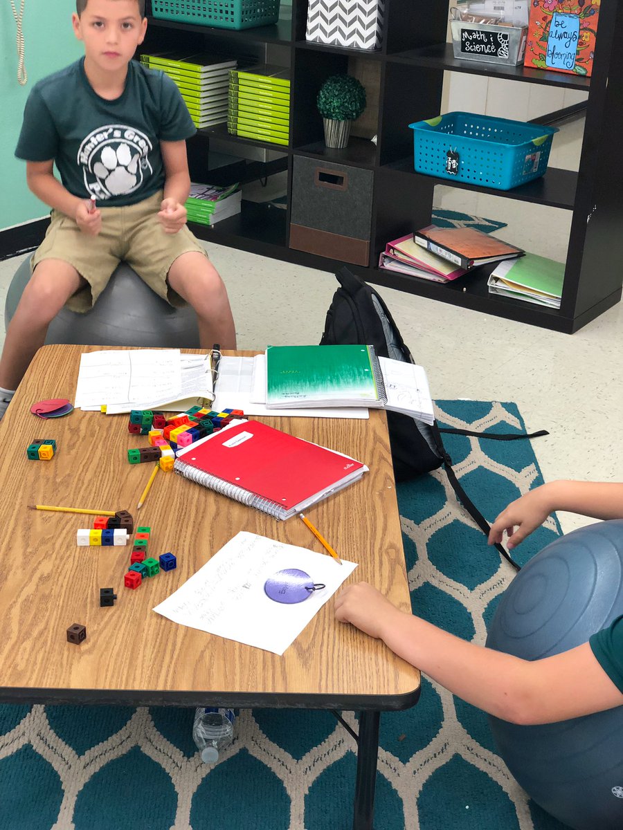 Glover_HGE's tweet photo. We are self assessing at โExpert Levelโ when constructing and calculating Volume of a right rectangular prism! #mathematics #grade5 #snapcubes #iTeachHGE #area3STEM https://t.co/ZxccuBsqca