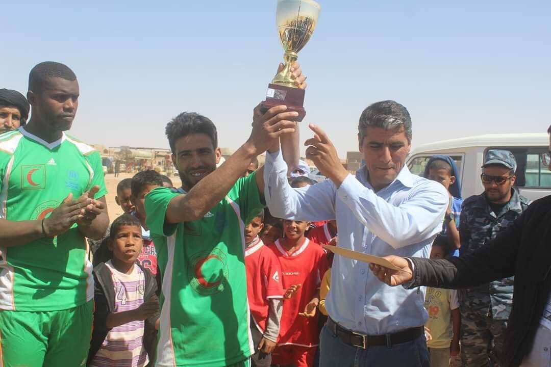 CONIFAOfficial's tweet photo. Some photos from the recently concluded Sahrawi Republic Cup 2019. 

The winners, Team Chahid Mahfoud El Welad, gets presented the trophy from the Sahrawi Minister of Youth and Sports Mr. Ahmed Lehbib https://t.co/4D6a0B0j5O