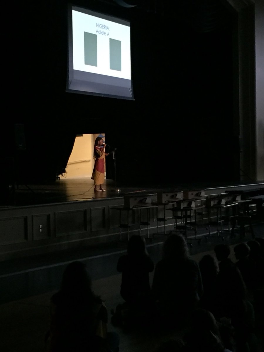 E2B2TrinityATL's tweet photo. Before the entire school, two 1st grade students courageously take the stage and proudly present their families’ cultures, specifically sharing about their dress, traditions, and celebrations #TrinityLearns #TrinityCOC https://t.co/oFpCXKlxGE