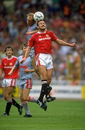 footingball's tweet photo. Prizes for everyone that can make the other 3 players in this pic with @Mike_Phelan_1 https://t.co/QVvmWKJoTR